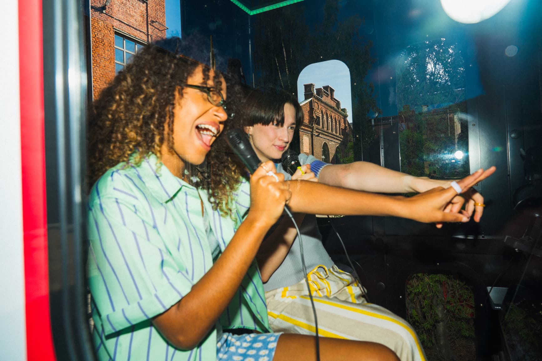 Friends singing karaoke